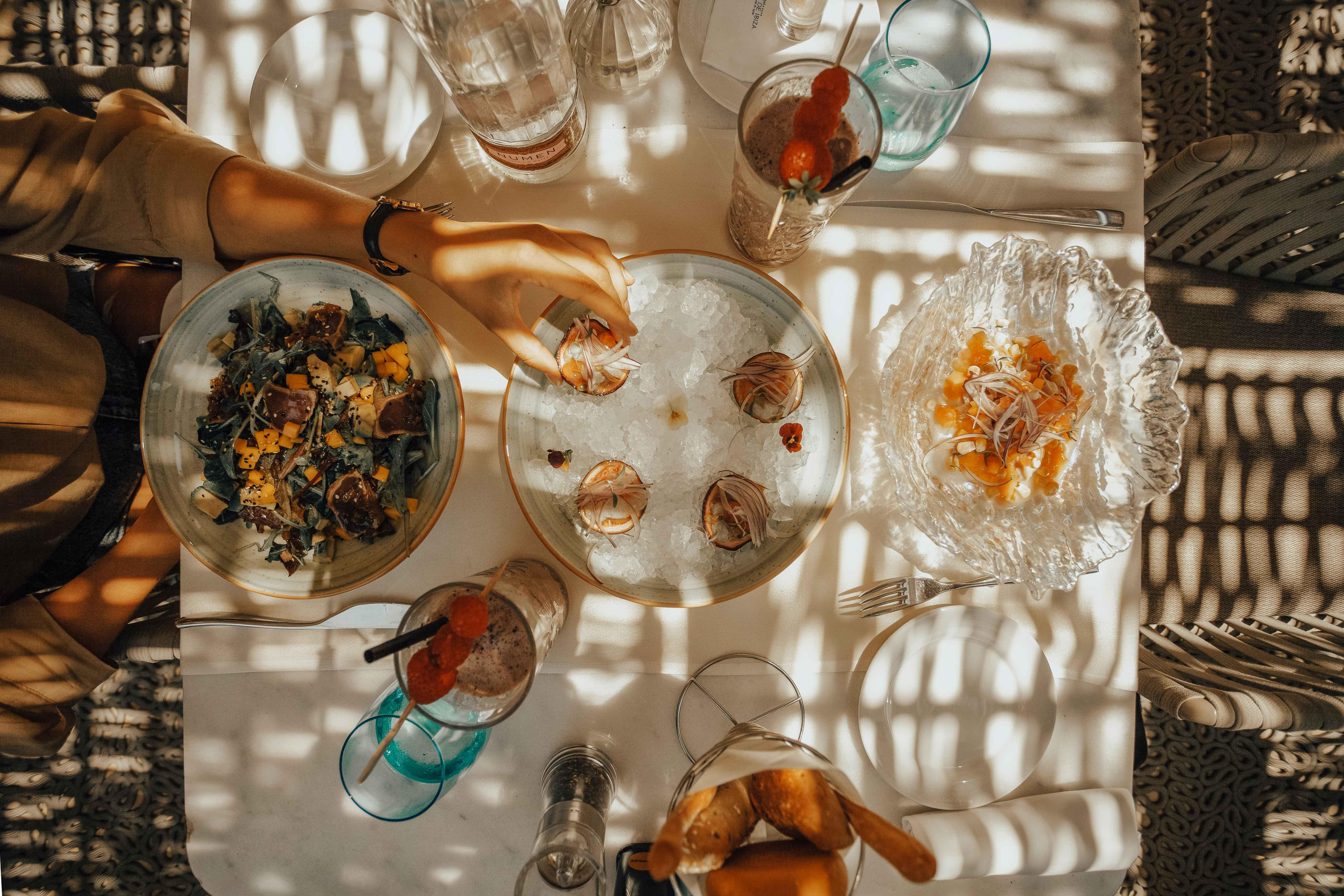 Aguas De Ibiza Grand Luxe Hotel - Small Luxury Hotel Of The World Santa Eularia des Riu Esterno foto A typical tapas bar table