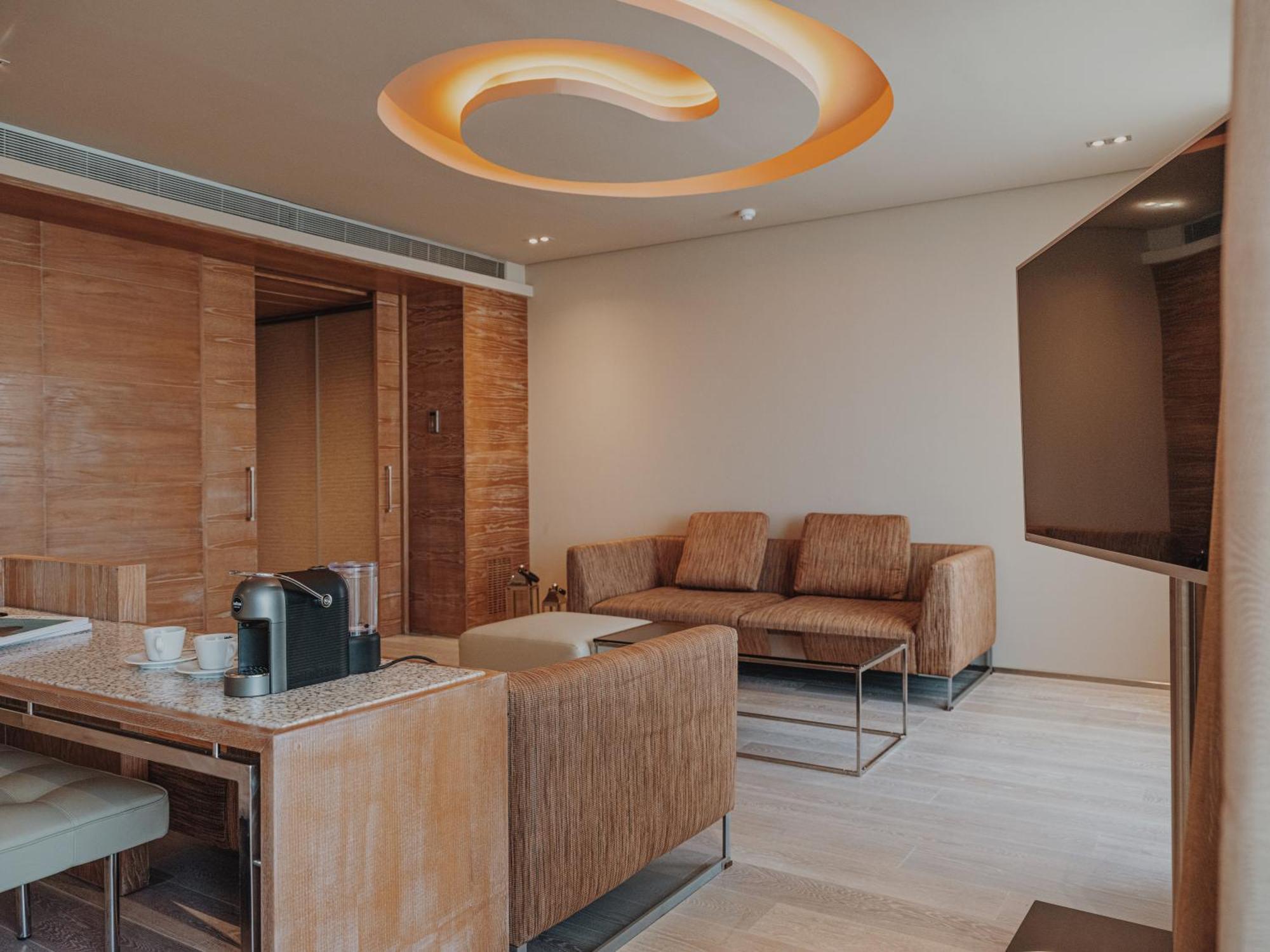 Aguas De Ibiza Grand Luxe Hotel - Small Luxury Hotel Of The World Santa Eularia des Riu Esterno foto A suite at the hotel