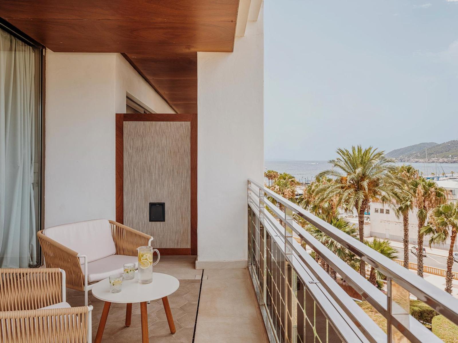 Aguas De Ibiza Grand Luxe Hotel - Small Luxury Hotel Of The World Santa Eularia des Riu Esterno foto A balcony at the hotel