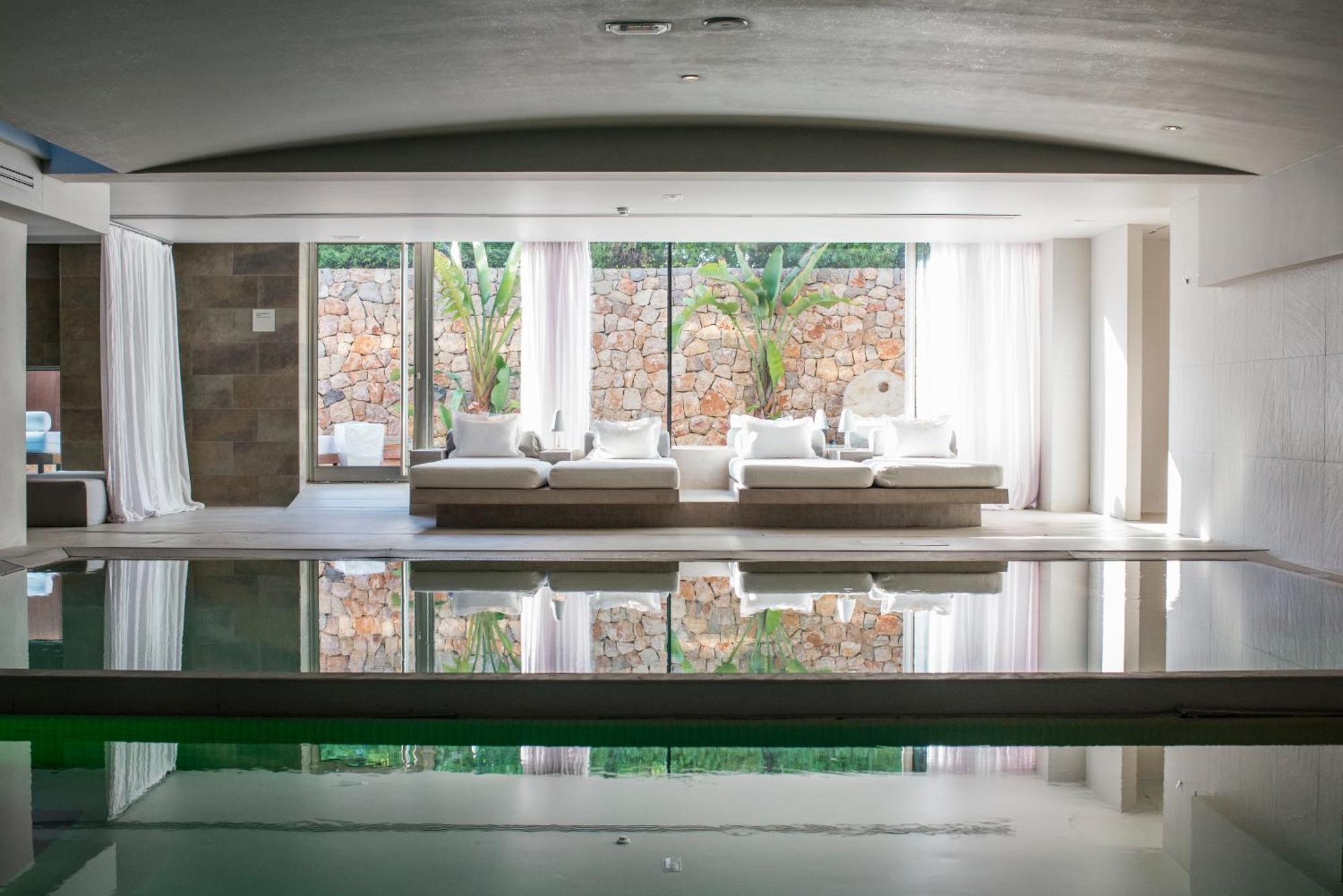 Aguas De Ibiza Grand Luxe Hotel - Small Luxury Hotel Of The World Santa Eularia des Riu Esterno foto The Spa at The Ivy Collection